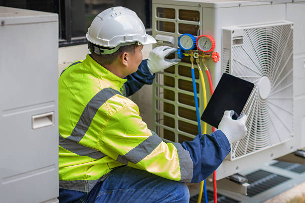Professional Hvac technician working in Millville, DE